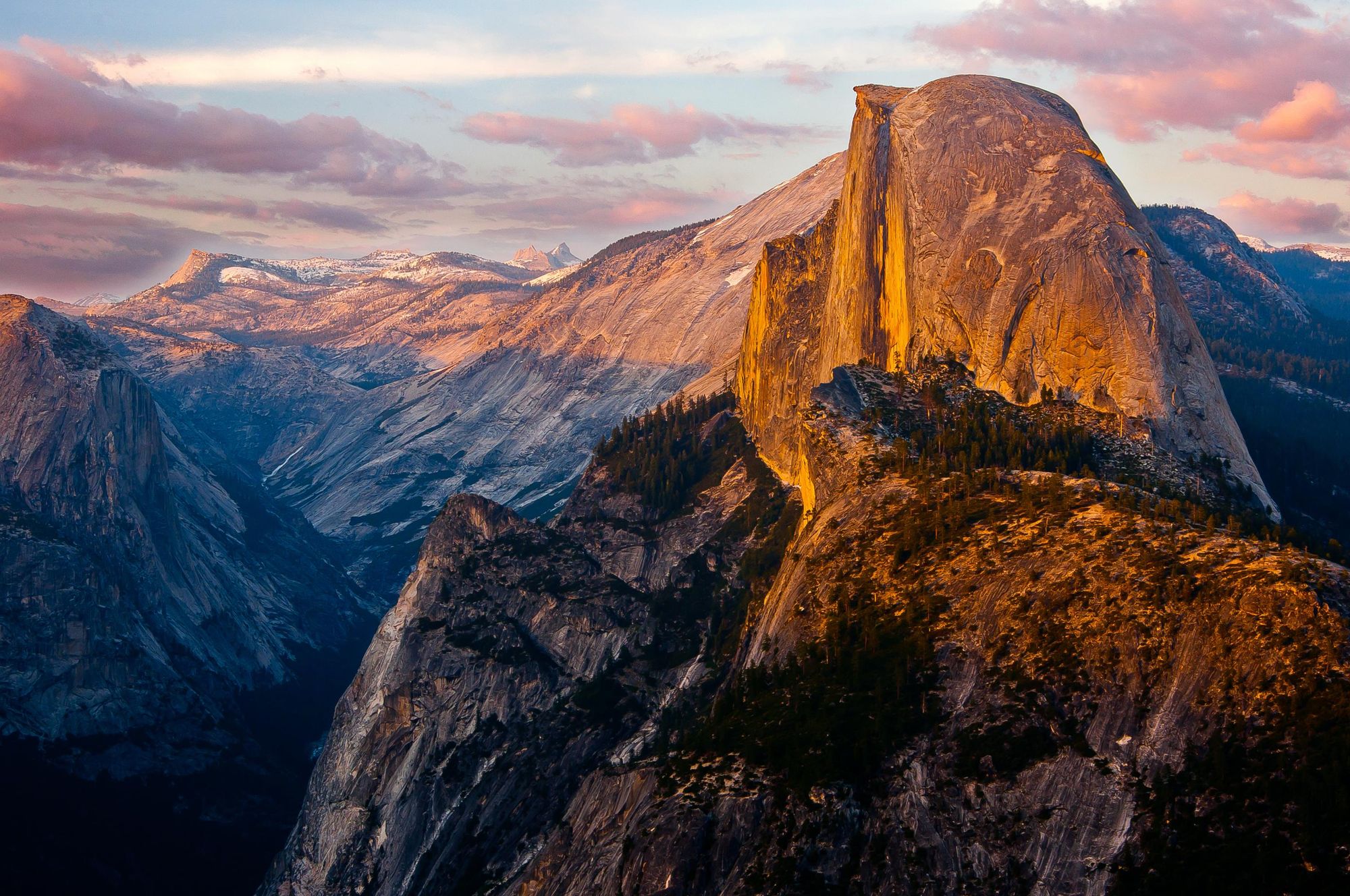 A brilliant sunset view of Half Dome from Glacier Point, a location only accessible via a strenuous hike. Photo: Getty