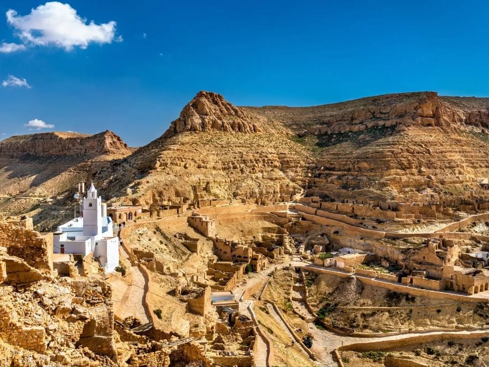 The village of Chenini, hewn into the hills. Photo: Getty.