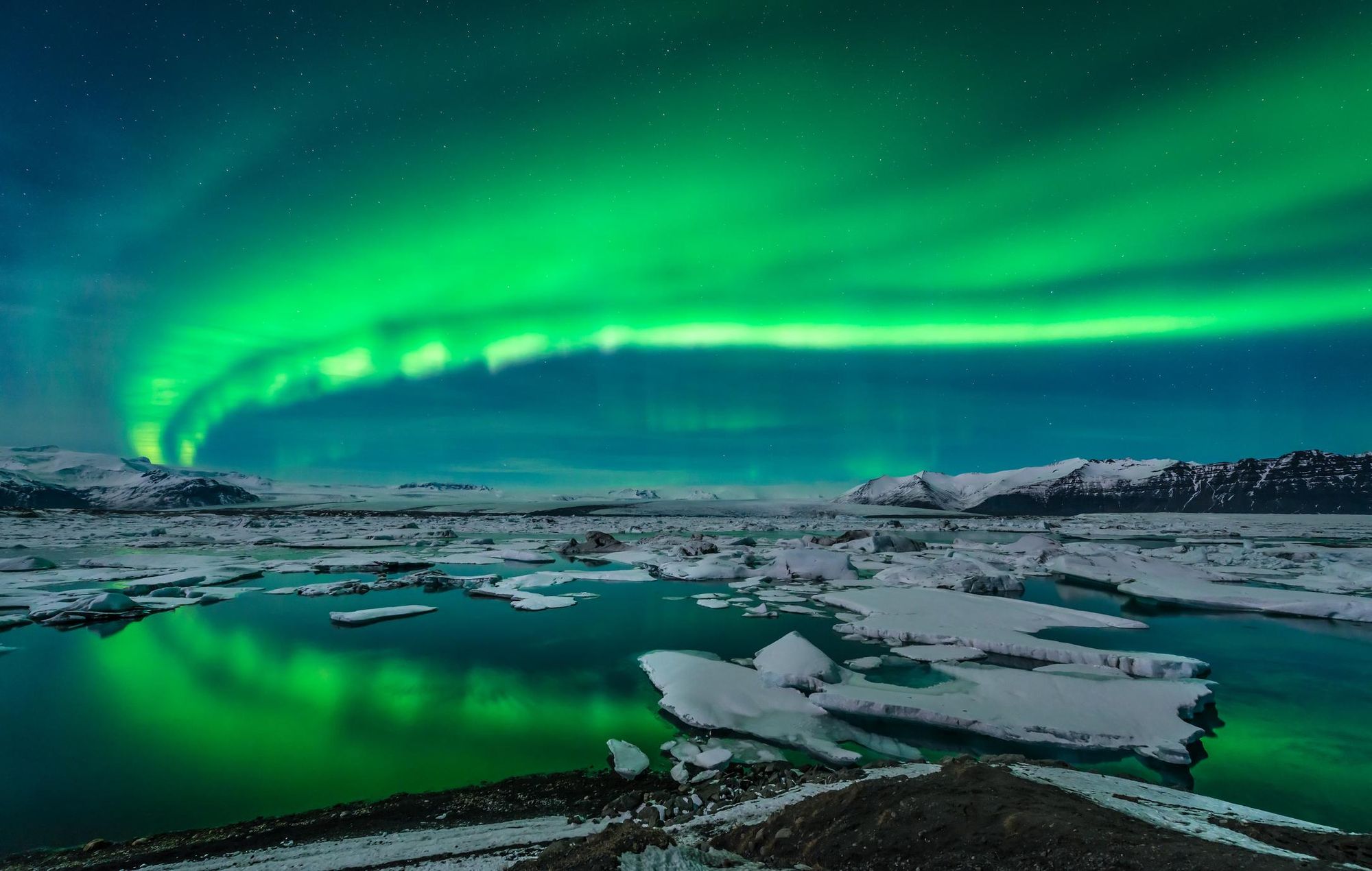 The green of aurora borealils above Jokulsarlon, Iceland. Photo: Getty