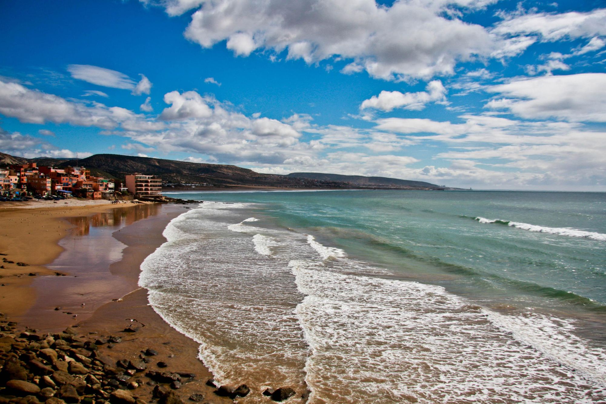 Learn to surf in the Moroccan winter, which is suitably more sunny than most of Europe. Photo: Getty