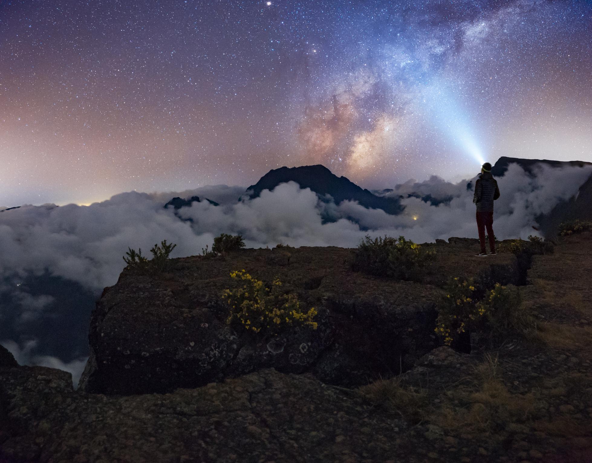 Watching the milky way over the Piton des Neiges at Maido in Saint-Paul, Reunion Island. Photo: Getty