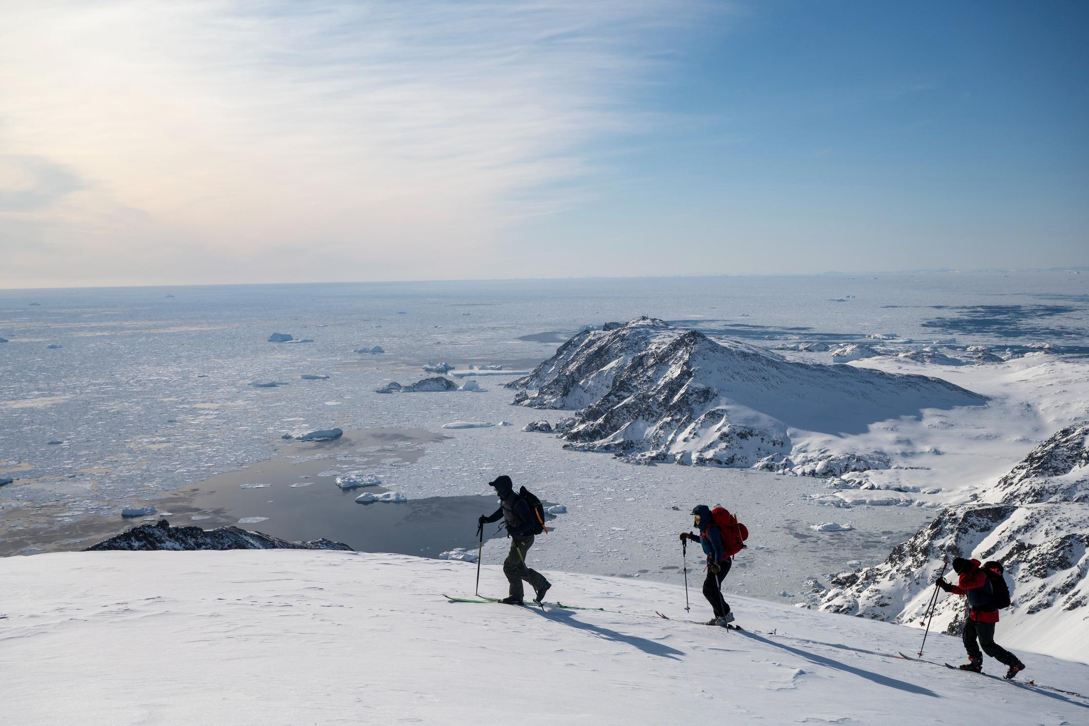 Ski touring across a glacial plane in Greenland. Photo: Getty