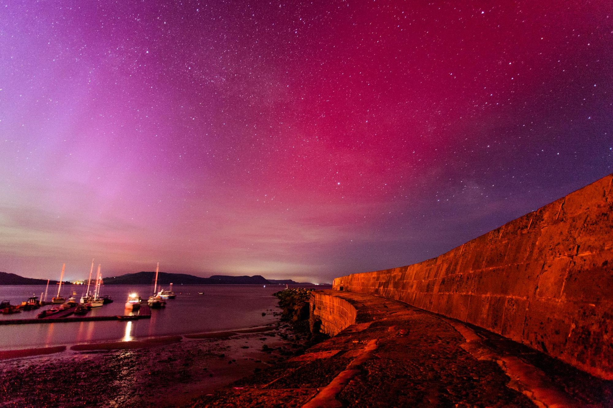 The Northern Lights in Lyme Regis, Dorset. Photo: Getty.