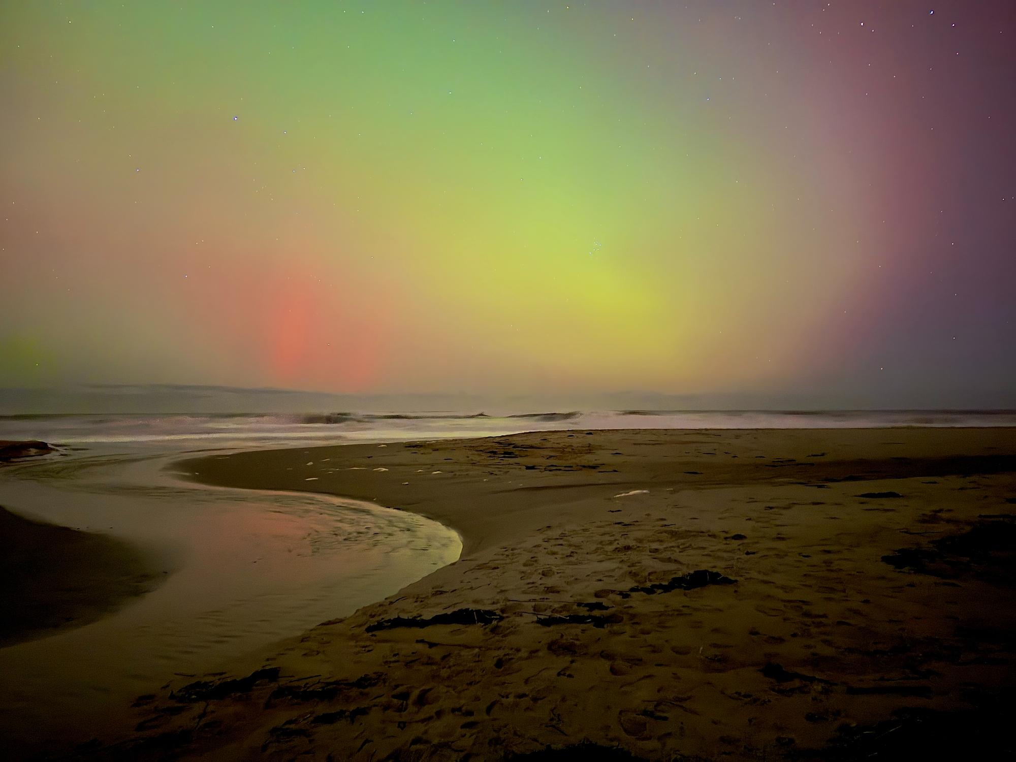 The northern lights over the North Sea in Northumberland. Photo: Getty.