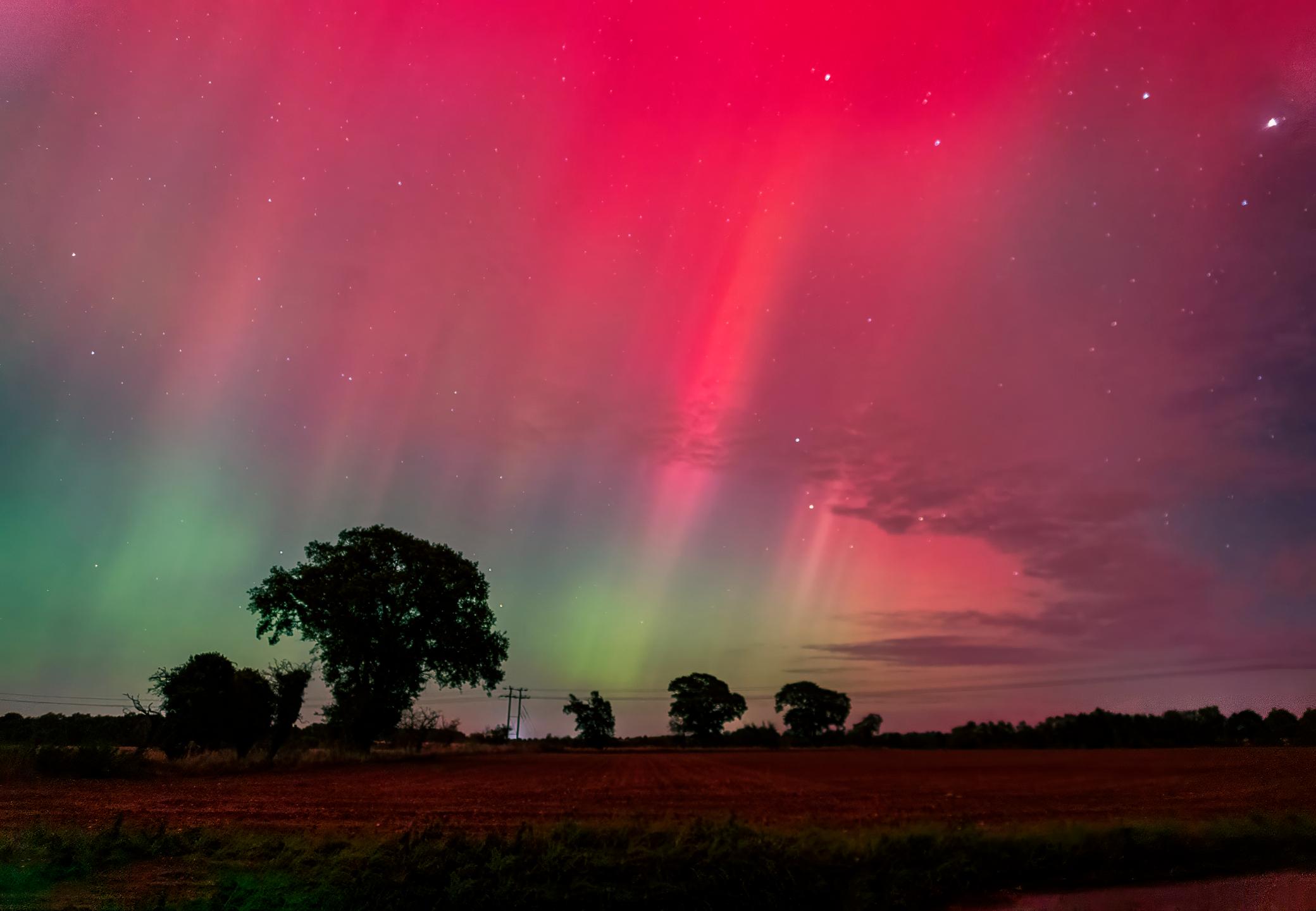 Scarlet displays of the northern lights near Suffolk. Photo: Getty.