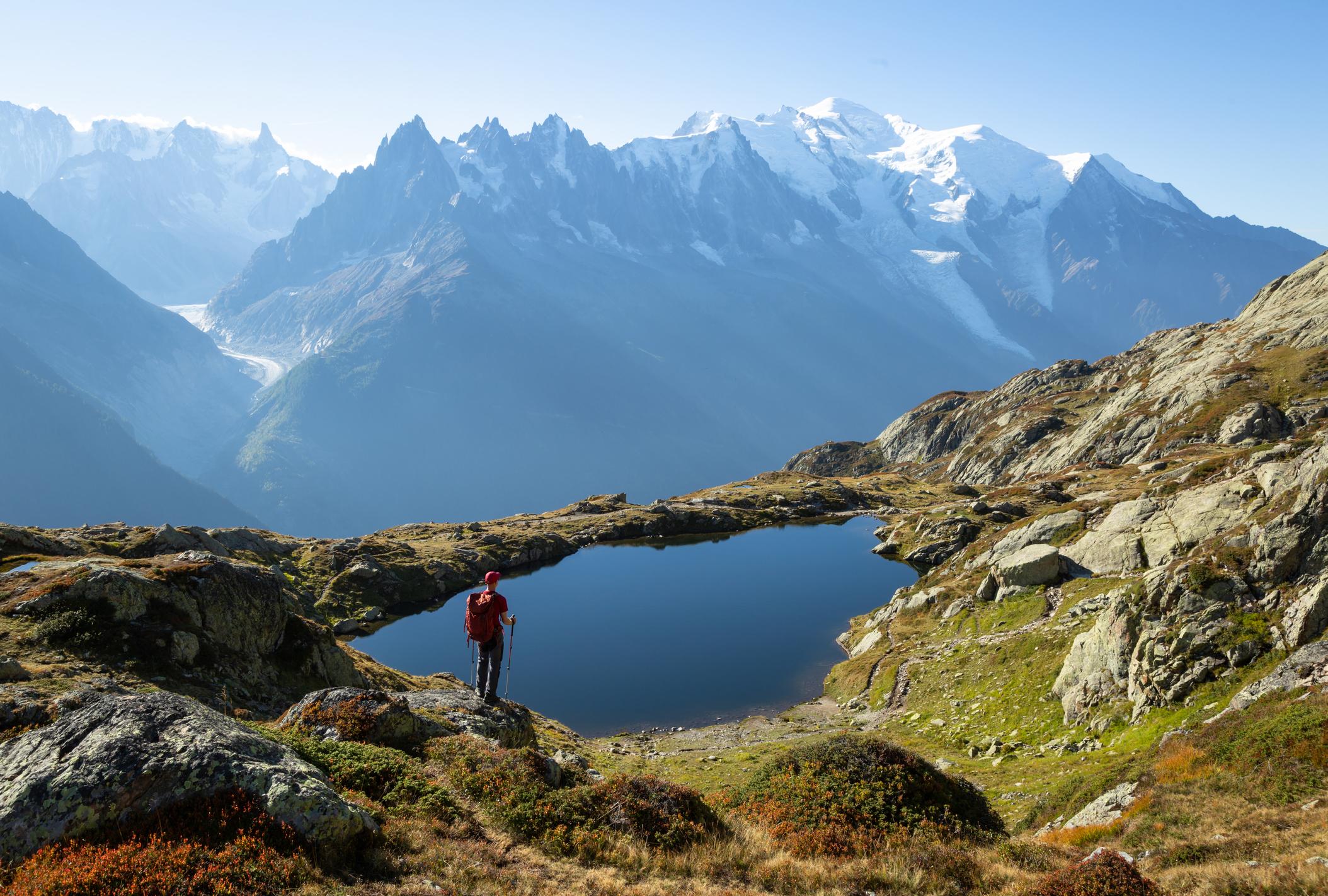 A man on the famous Tour du Mont Blanc near Chamonix, with stunning views of the French Alps. Photo: Getty