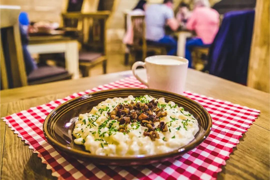 Bryndzové halušky, a popular Slovakian dish. Photo: Canva.