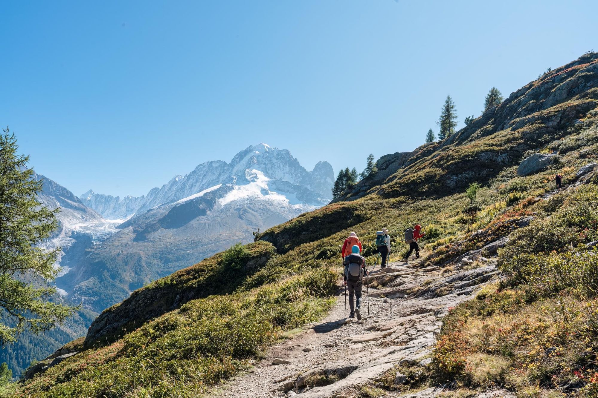 A group of hikers on the summit trail to Lac Blanc in the French Alps. Photo: Getty