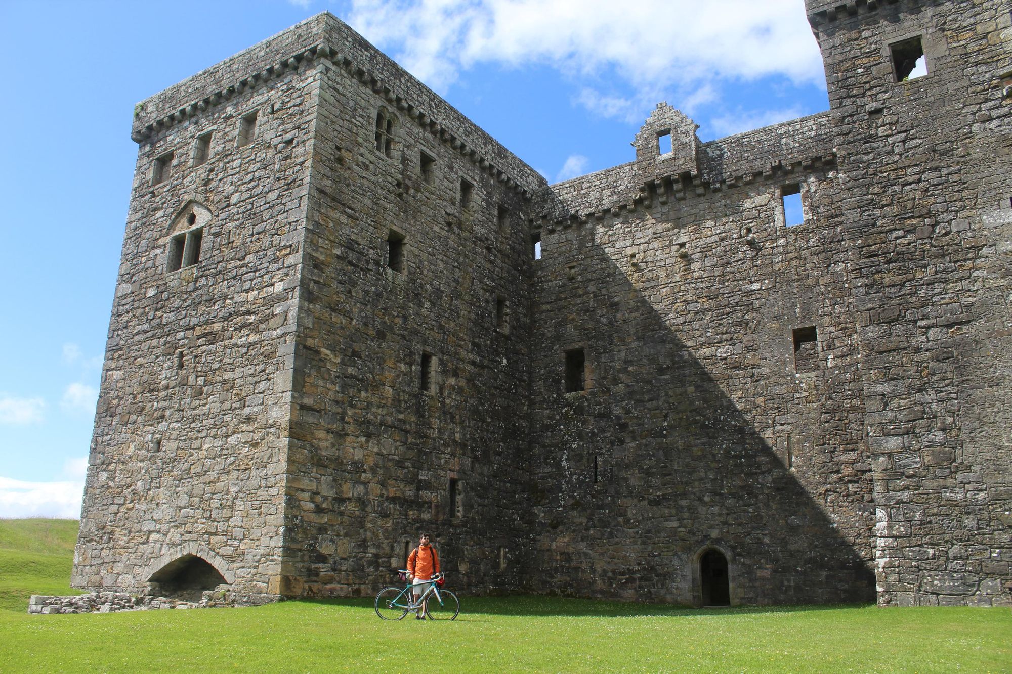 A cyclist beneath Hermitage Castle, a 14th-century fortress in the remote valley of the Hermitage Water, part of Liddesdale in Roxburghshire. Photo: Stuart Kenny