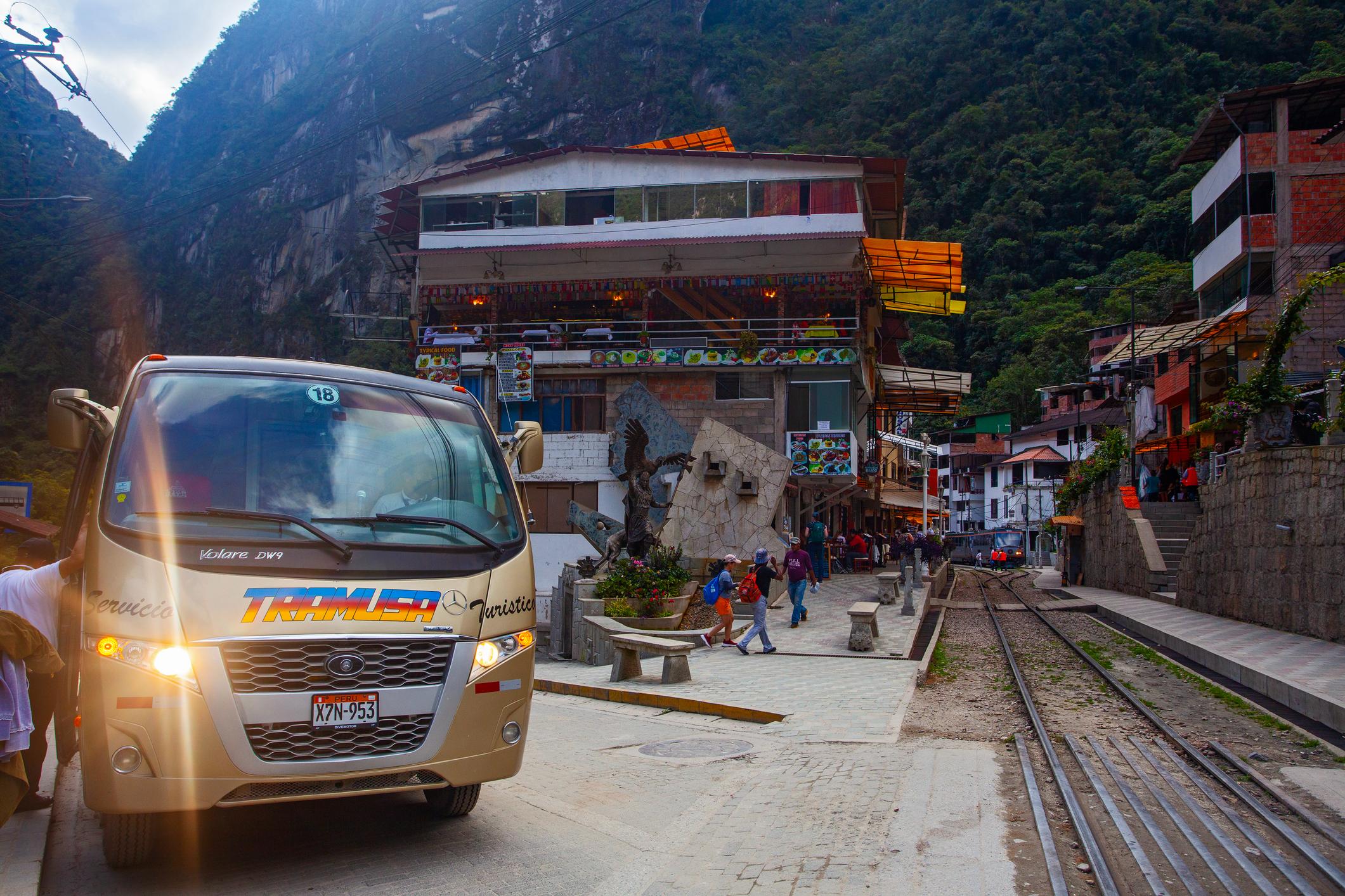 The bus terminal in Aguas Calientes with a departure going up to Machu Picchu. Photo: Getty