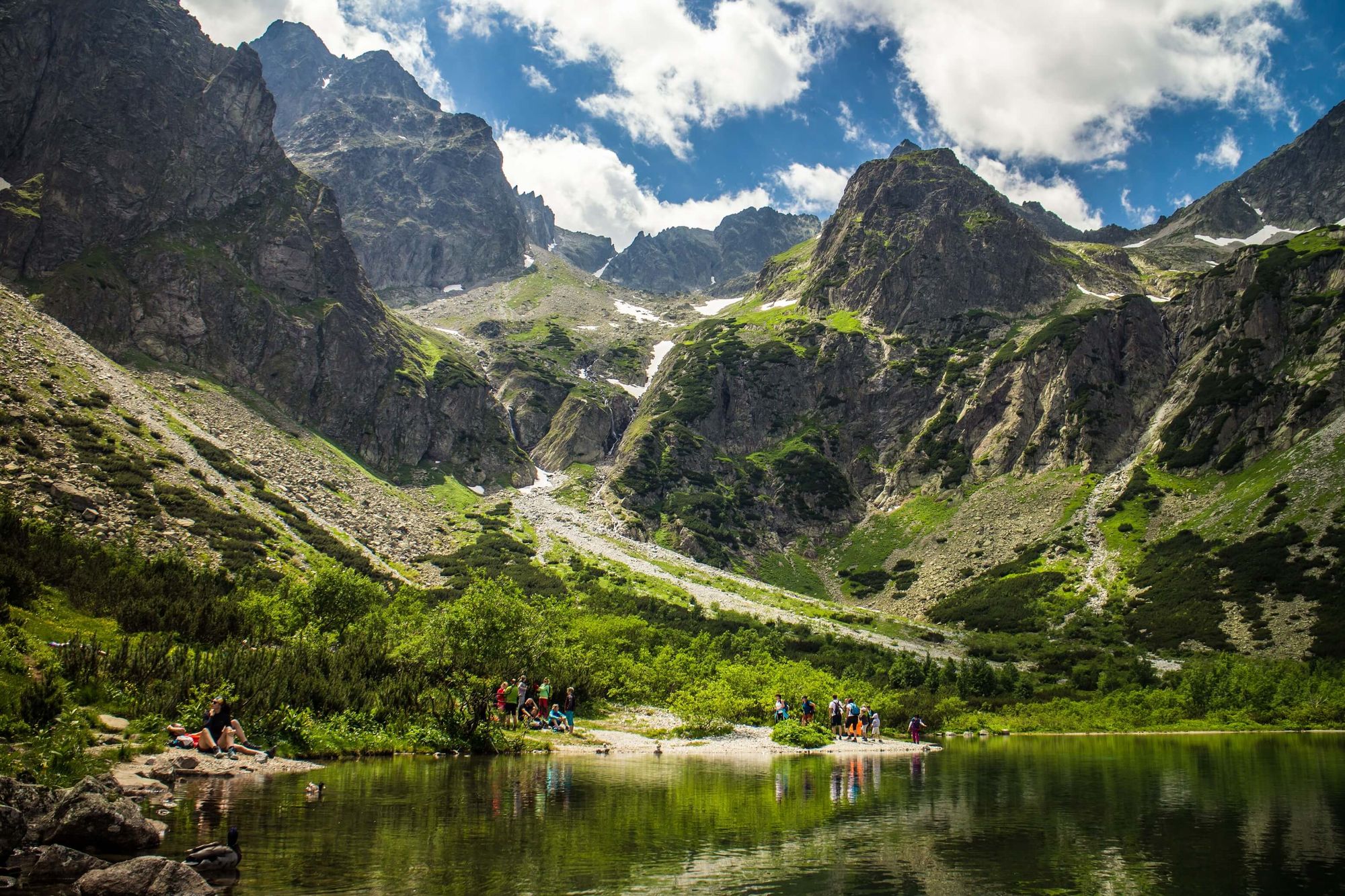 Hikers taking a break at Green Lake. Photo: Slovakation.