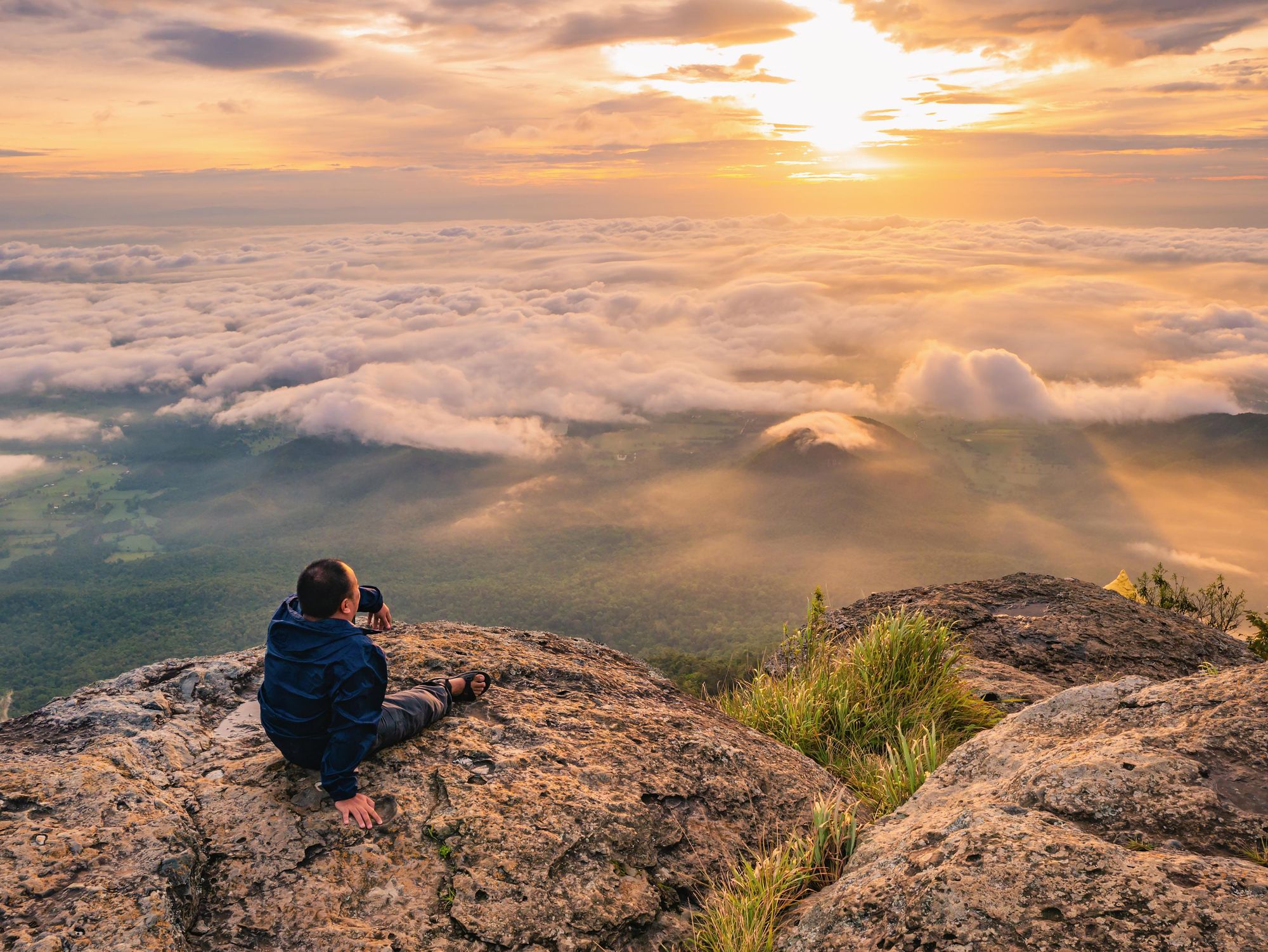 Sunrise from Khao Luang mountain in Ramkhamhaeng National Park. Photo: Getty