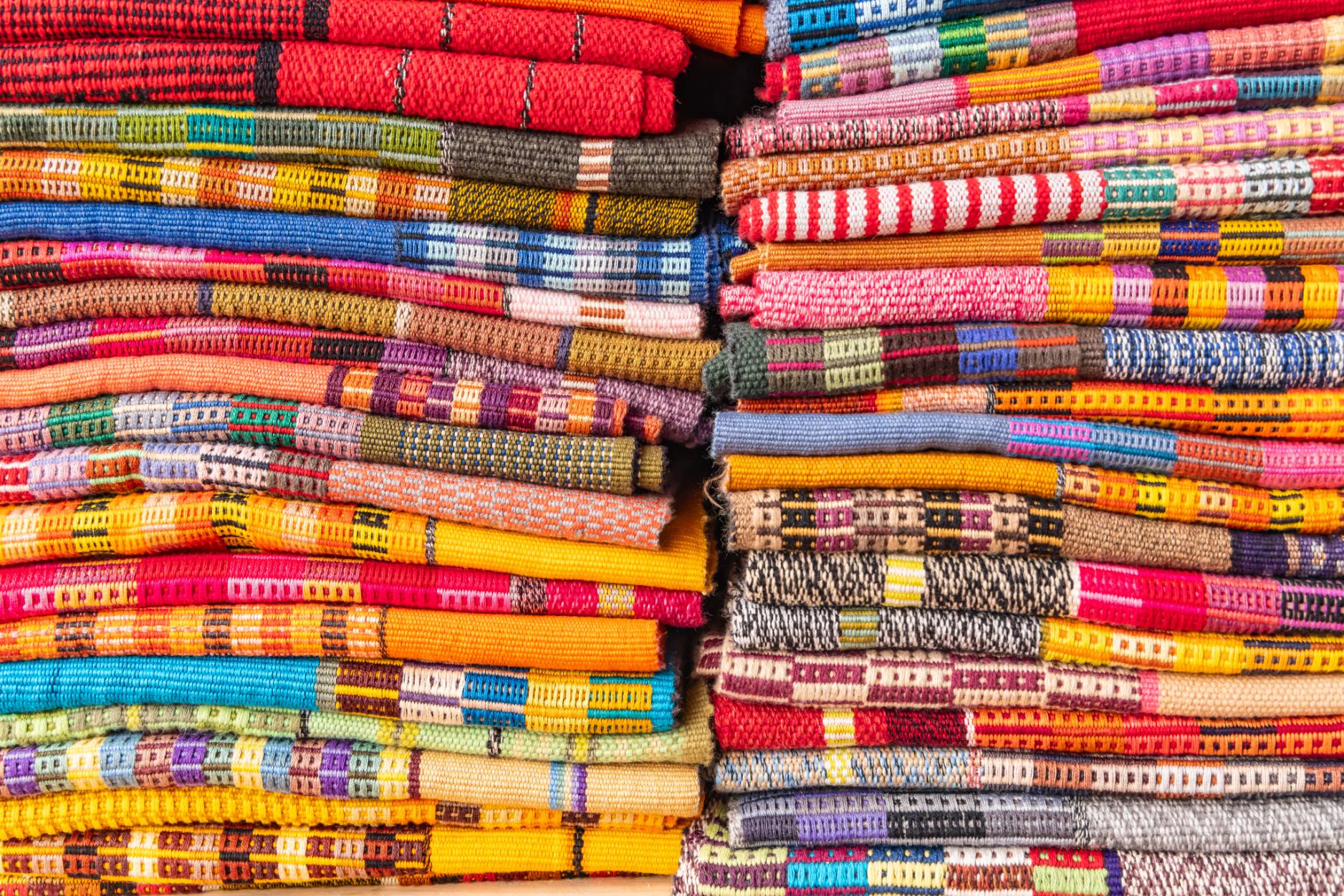 Woven handicrafts for sale in San Juan la Laguna. Photo: Getty.